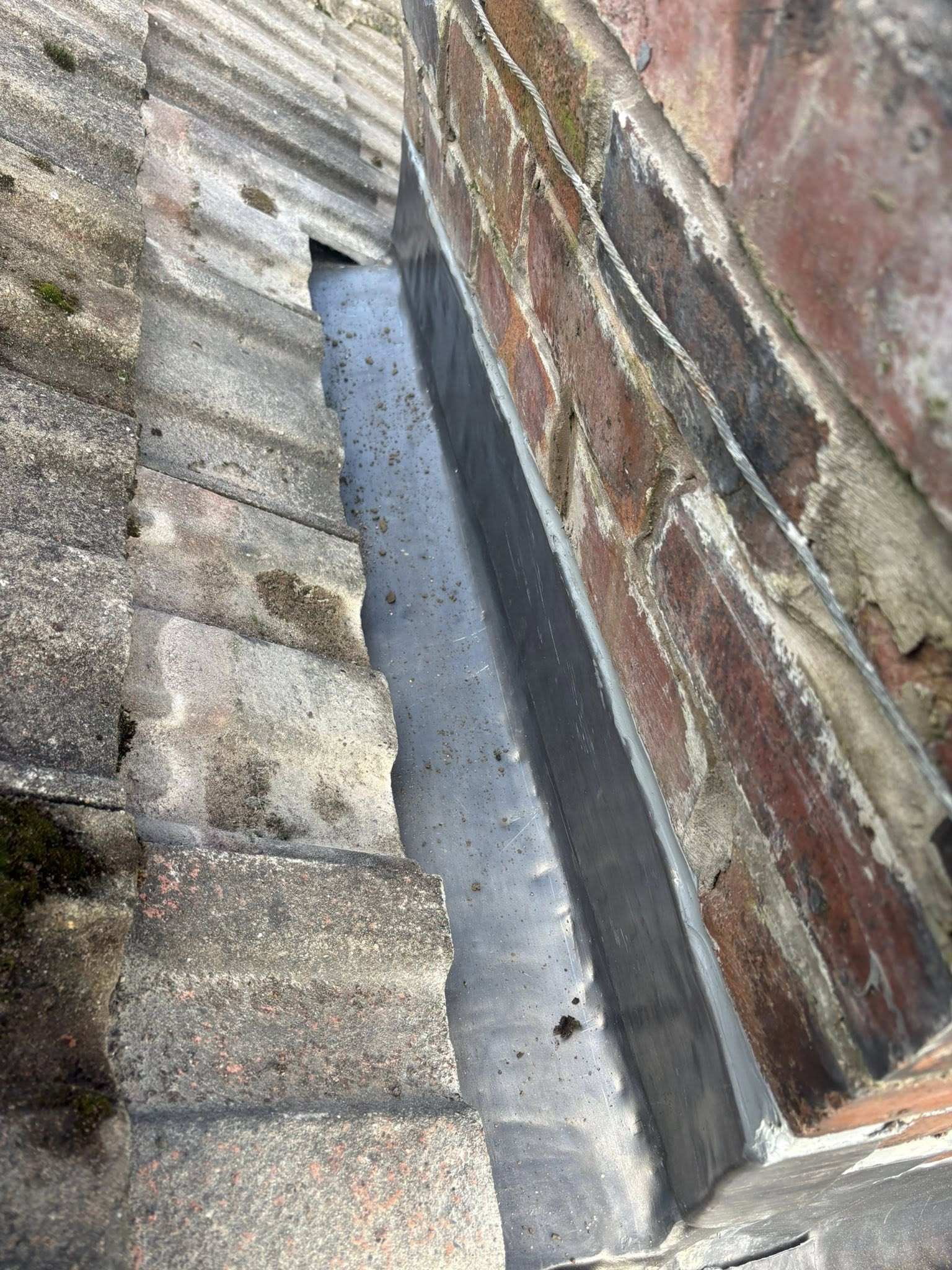 New leadwork around chimney base