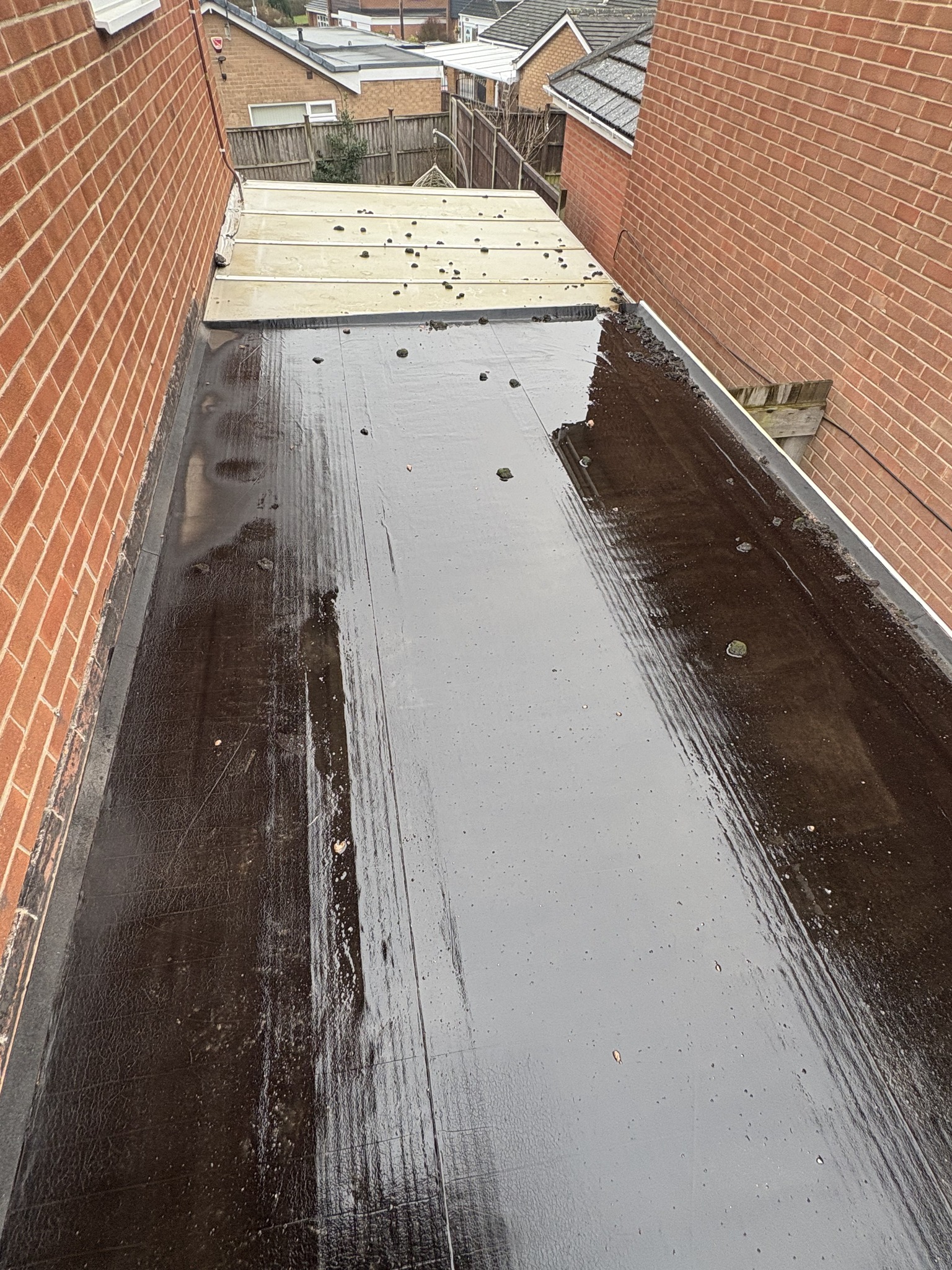 Wet small rubber roof of carport