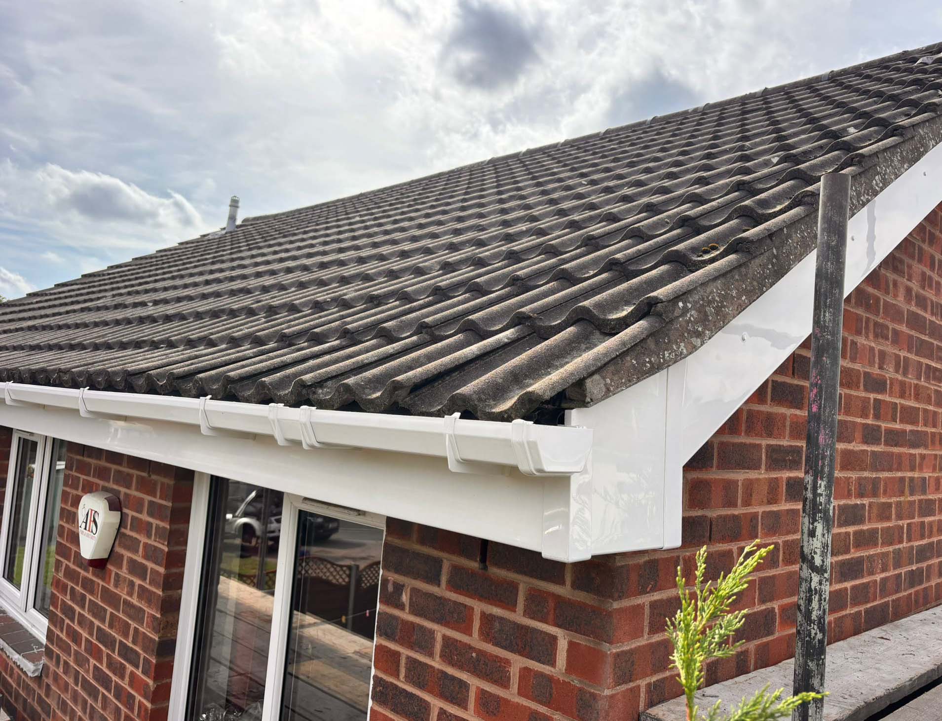 Gutters and roof replacement after