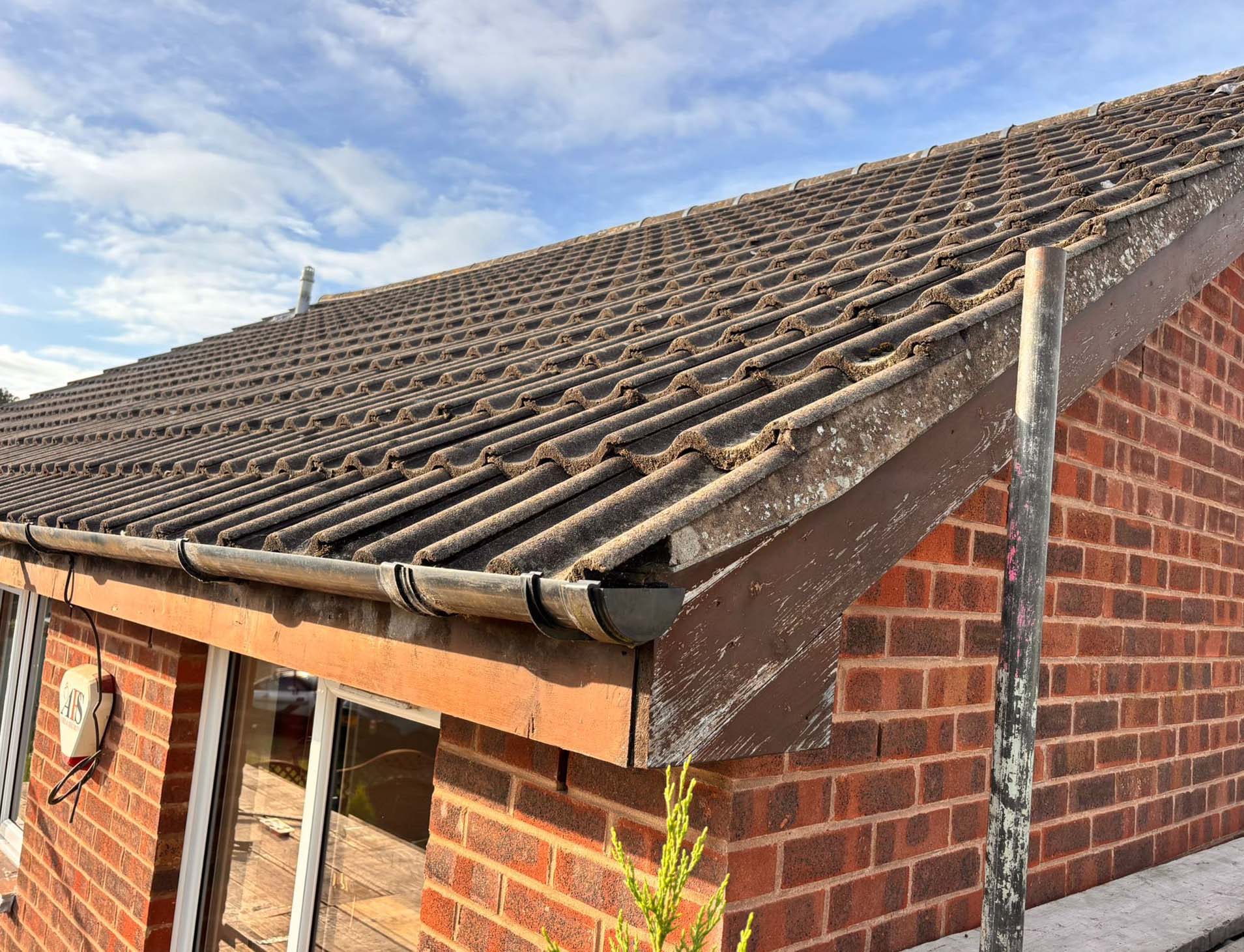 Gutters and roof replacement before